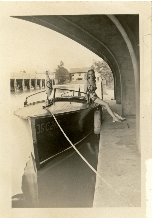 My mother with Phil Wood's boat, one of Gar's brothers, at Grayhaven c. 1943 during the time grandpa worked for Gar Wood.